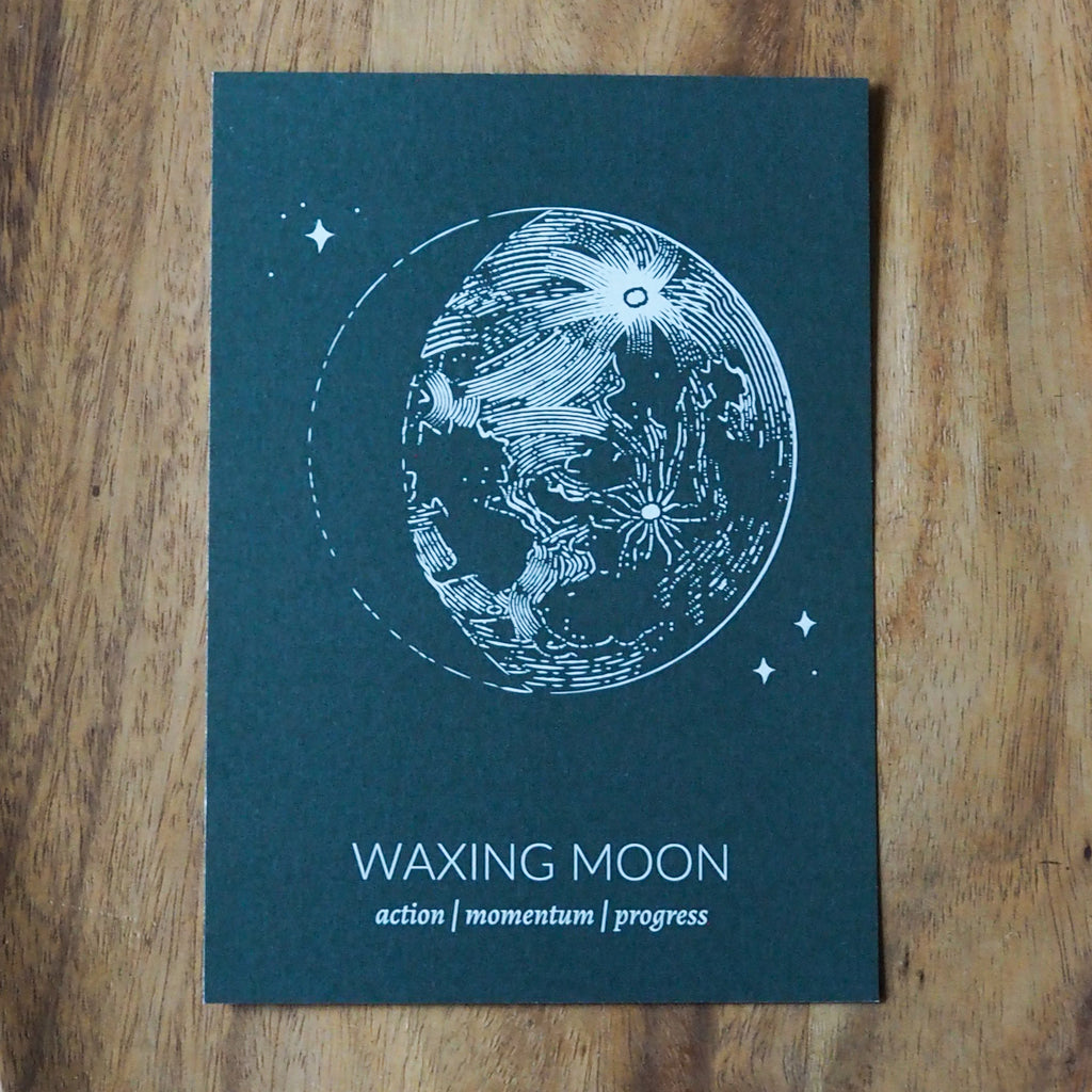 green waxing moon lunar phase print on wooden background