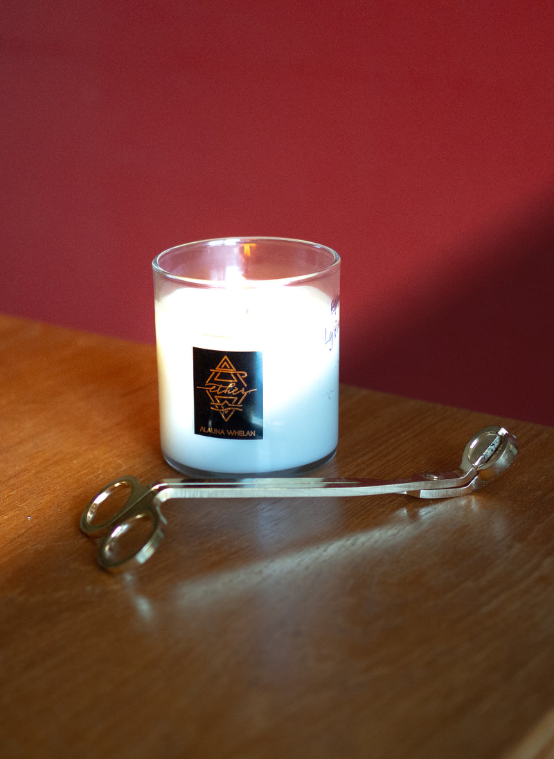 luxury candle with gold wick trimmers