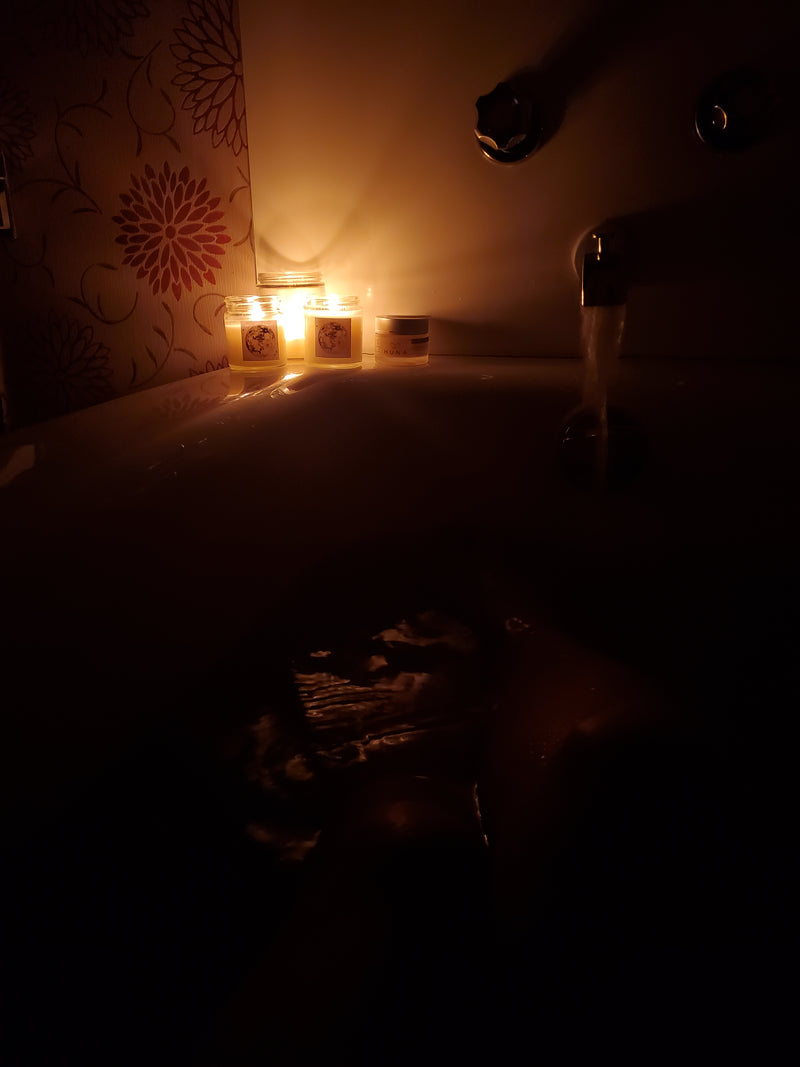 full bath tub with candlelit ambiance