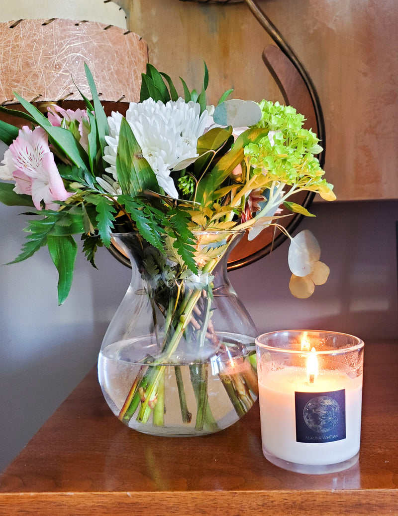 full moon soy candle with fresh cut florals