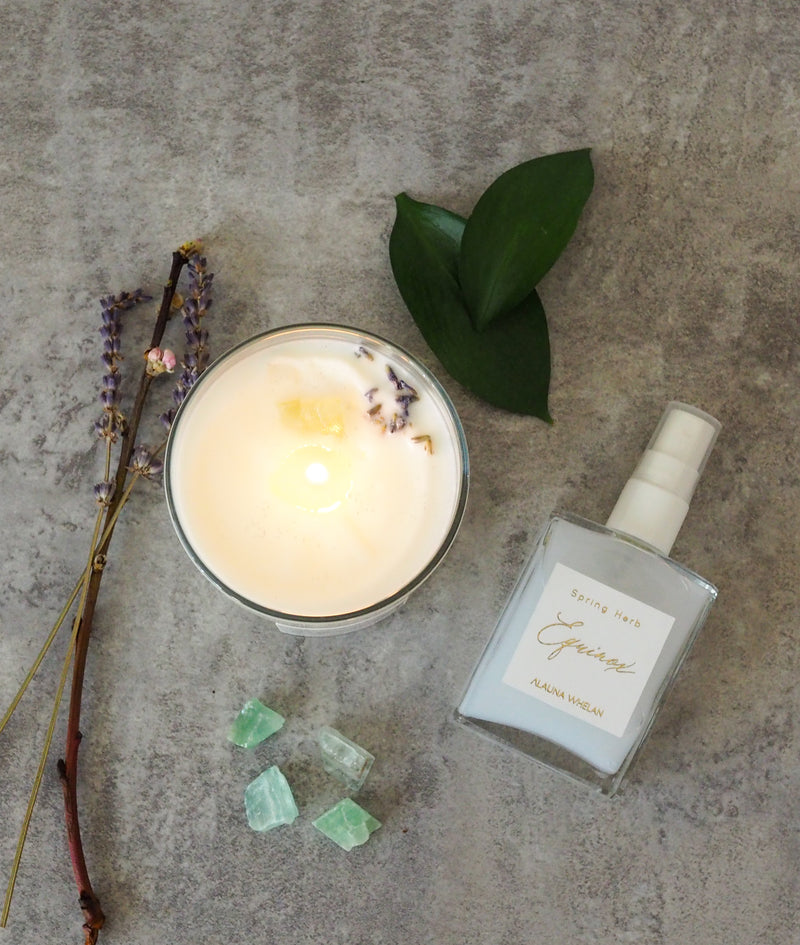 spring candle and ritual mist with crystals and botanicals