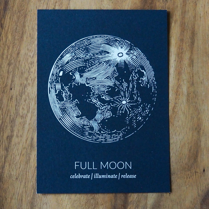 blue full moon lunar print on wooden background
