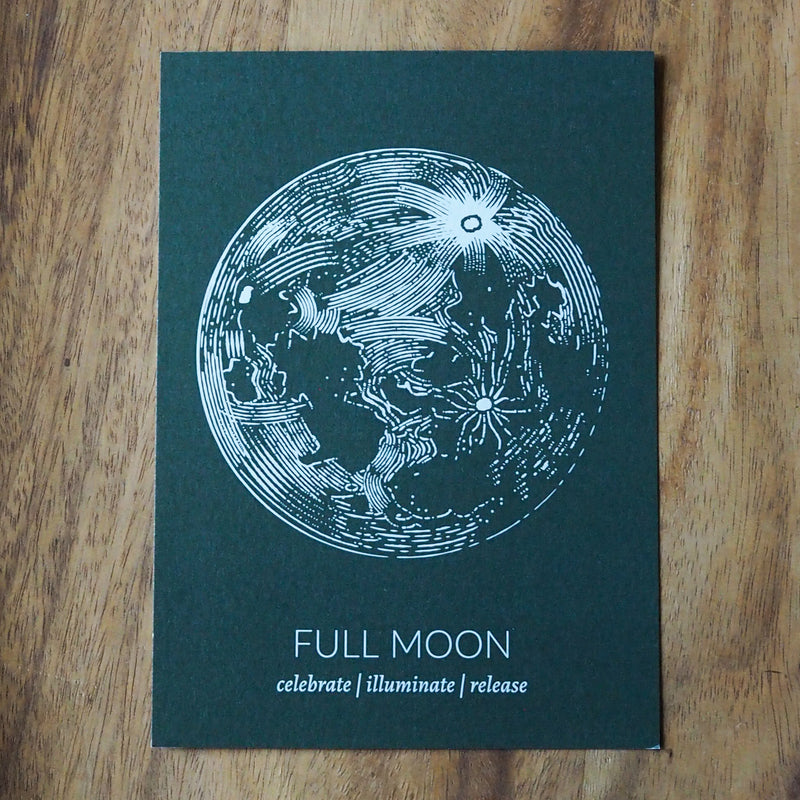green full moon lunar print on wooden background