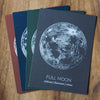 four full moon prints in different colors: rust, blue, green, grey