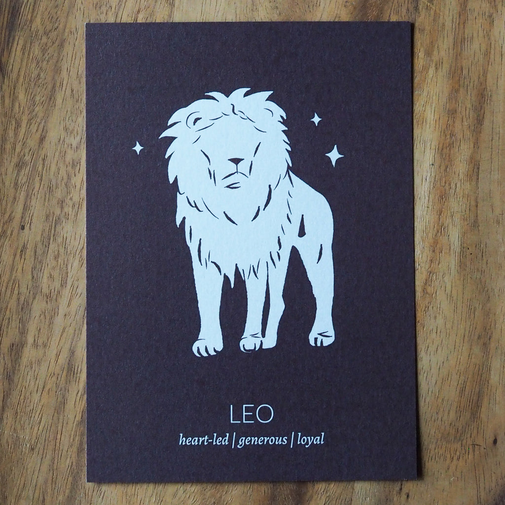 leo zodiac astrology print on wooden background