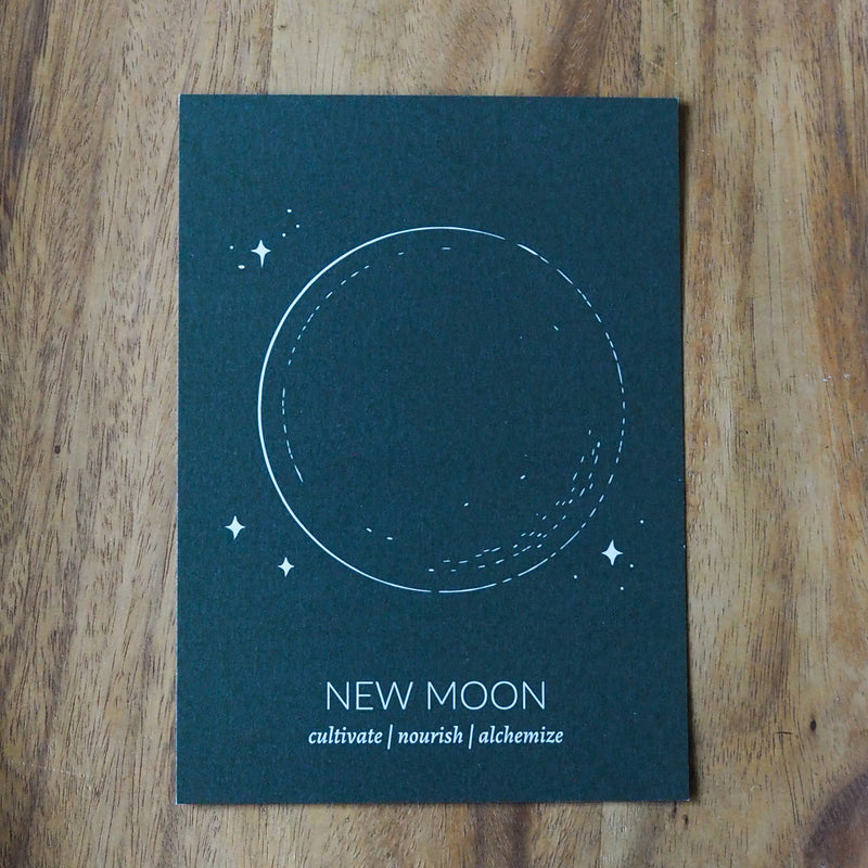 green new moon print on wooden background