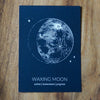 waxing moon lunar print on wooden background