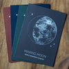 four waxing moon lunar phase prints in different colors: rust, blue, green, grey