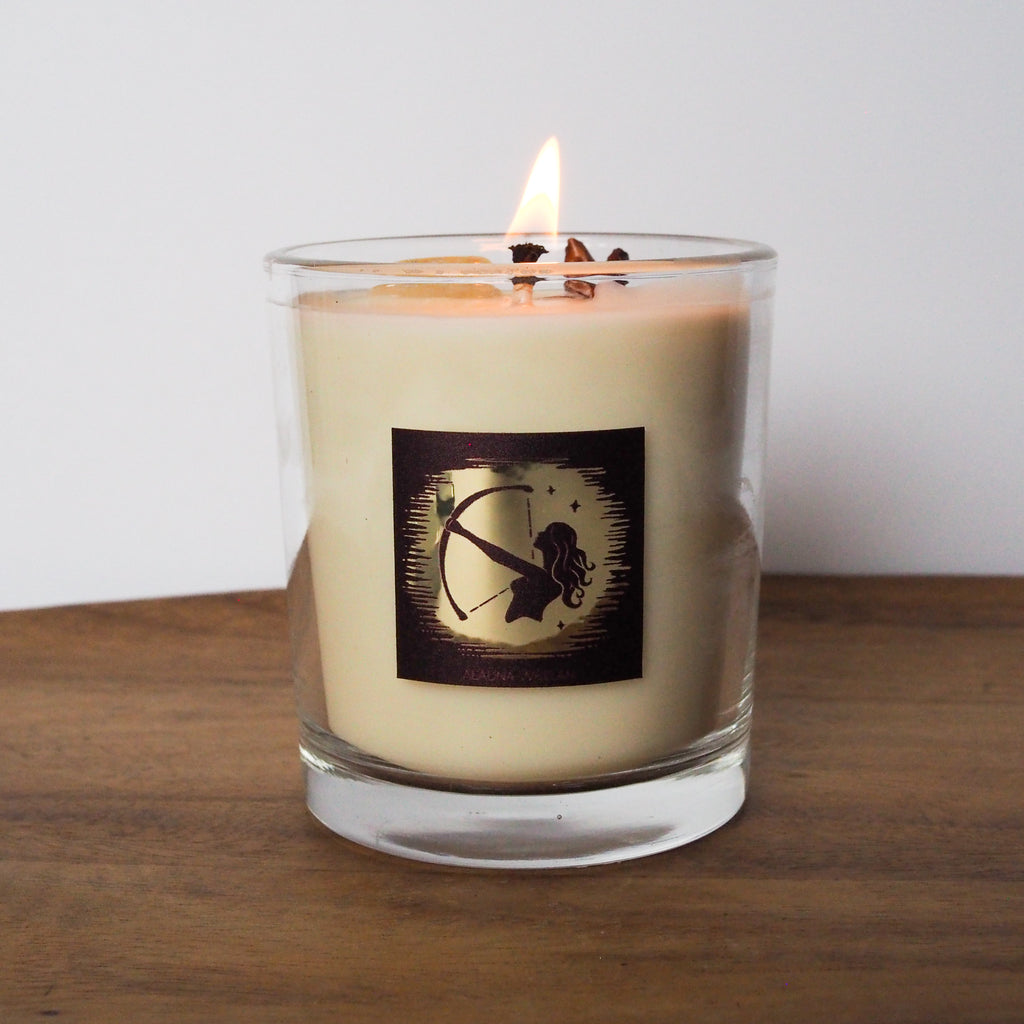 lit luxury sagittarius zodiac crystal infused intention candle